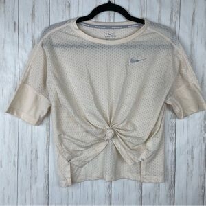 Nike cream medium perforated running crop top